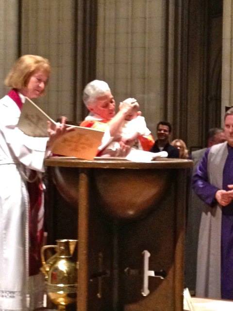 Getting baptized by Rev. Gina, Vicar Jan and Dean Gary.